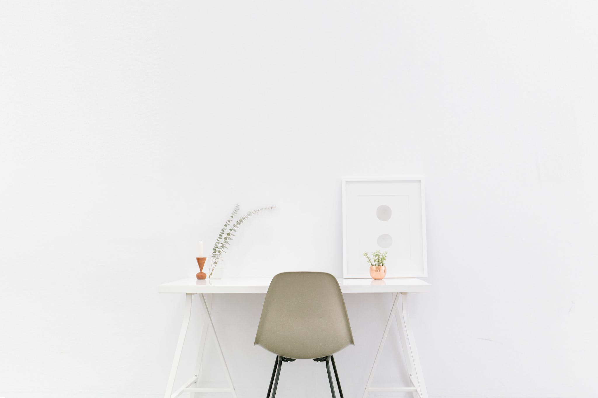 Beige and Black Chair in Front of White Desk